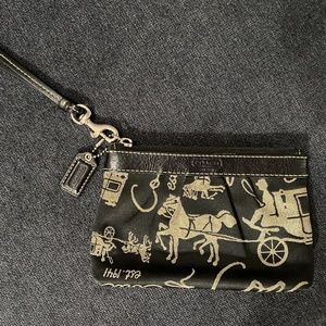 Coach leather trim wristlet in horse/carriage fabr